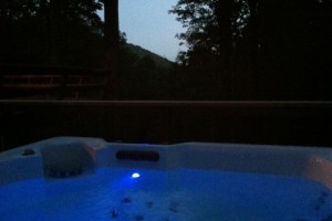 Relaxing hot tub by night.